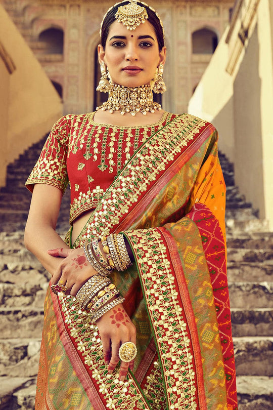 Red and Orange pure silk saree with heavy aanchal golden border and printed blouse (Unstitched)