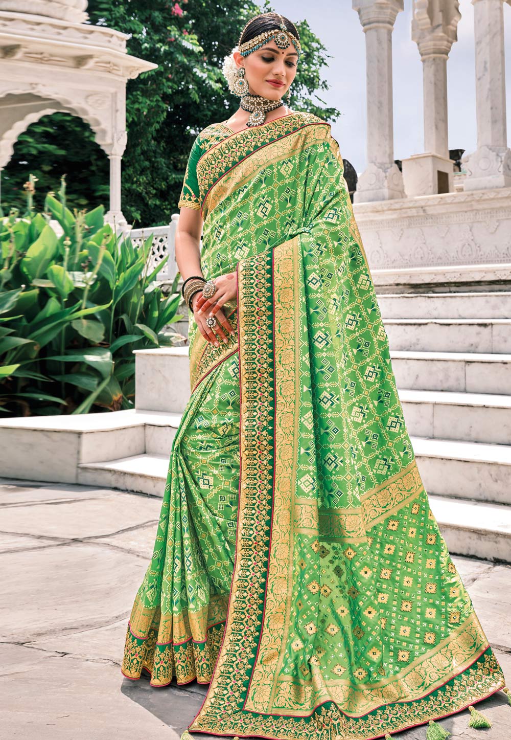 Green Patola pure silk saree with heavy aanchal golden border and printed blouse (Unstitched)