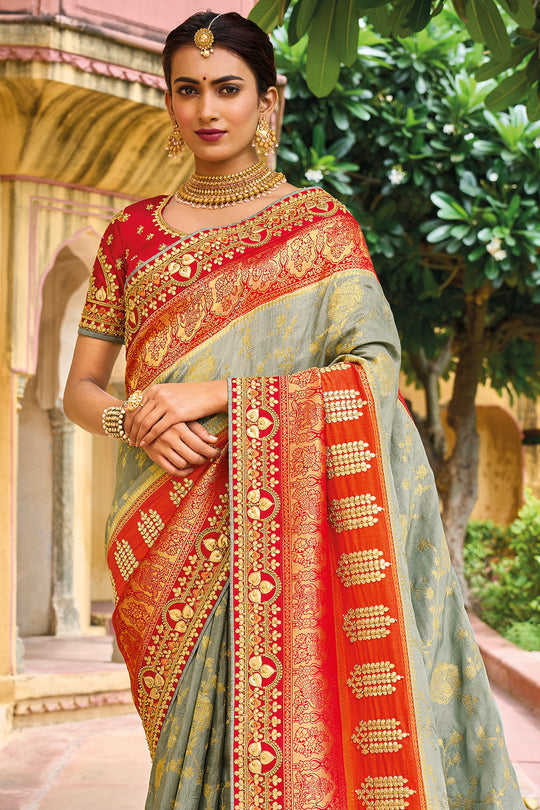 Red pure silk saree with heavy aanchal golden border and printed blouse (Unstitched)