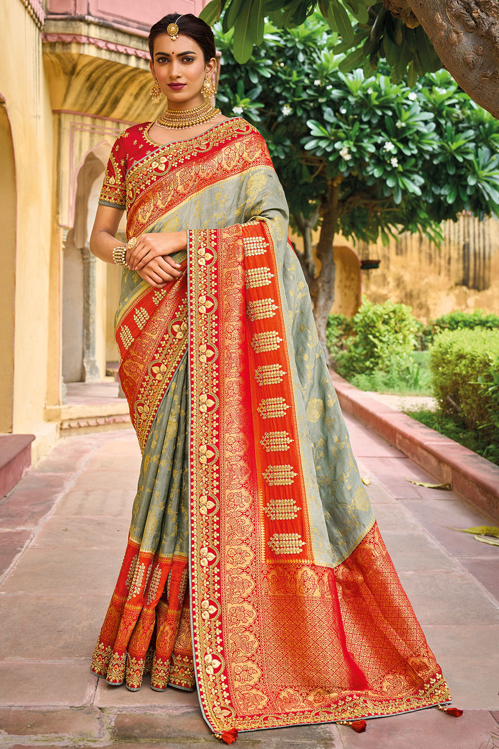 Red pure silk saree with heavy aanchal golden border and printed blouse (Unstitched)