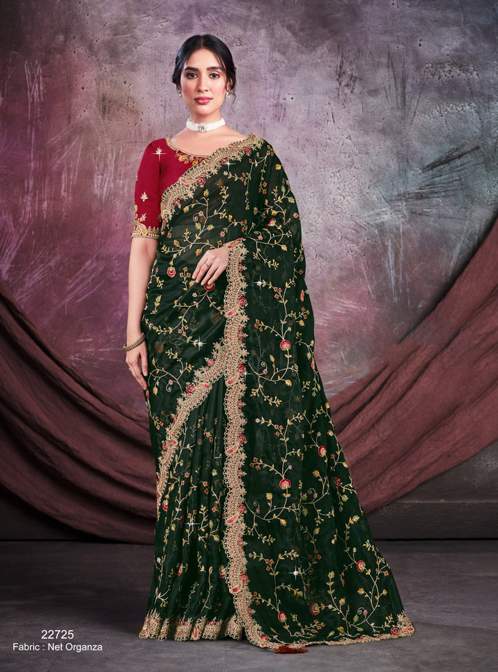 Green pure silk saree with heavy aanchal golden border and red printed blouse (Unstitched)