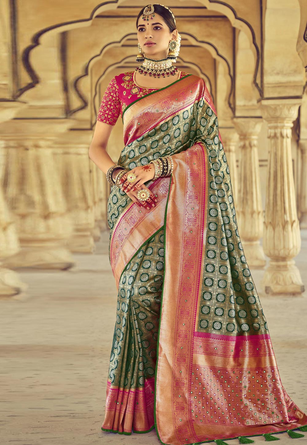 Green pure silk saree with heavy aanchal golden border and printed blouse (Unstitched)