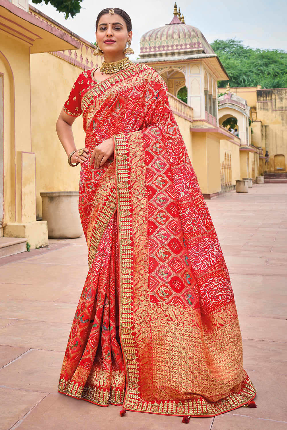 Red pure silk saree with heavy aanchal golden border and printed blouse (Unstitched)