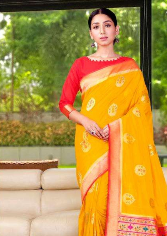 Yellow pure silk saree with heavy aanchal red golden border and printed red blouse (Unstitched)