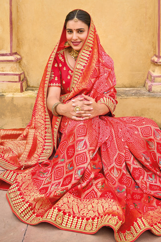 Red pure silk saree with heavy aanchal golden border and printed blouse (Unstitched)