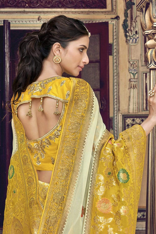 Yellow and Cream pure silk saree with heavy aanchal golden border and printed blouse (Unstitched)