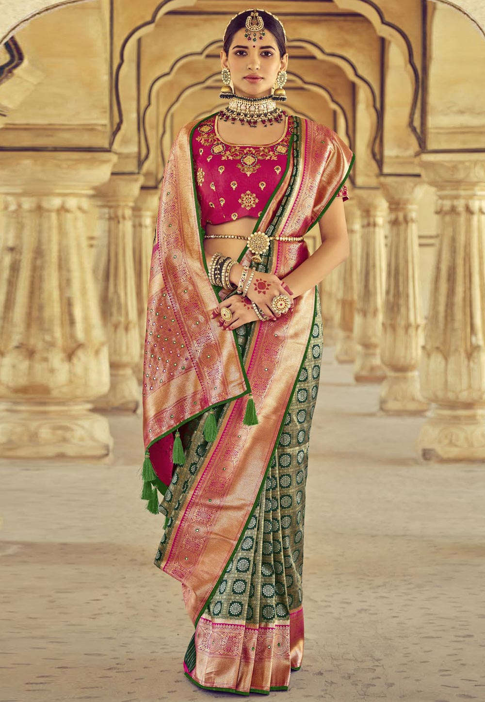 Green pure silk saree with heavy aanchal golden border and printed blouse (Unstitched)