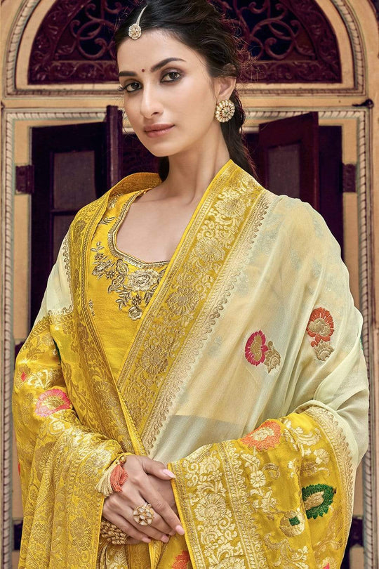 Yellow and Cream pure silk saree with heavy aanchal golden border and printed blouse (Unstitched)