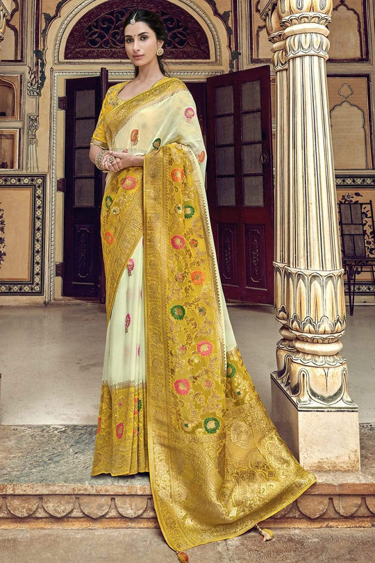 Yellow and Cream pure silk saree with heavy aanchal golden border and printed blouse (Unstitched)