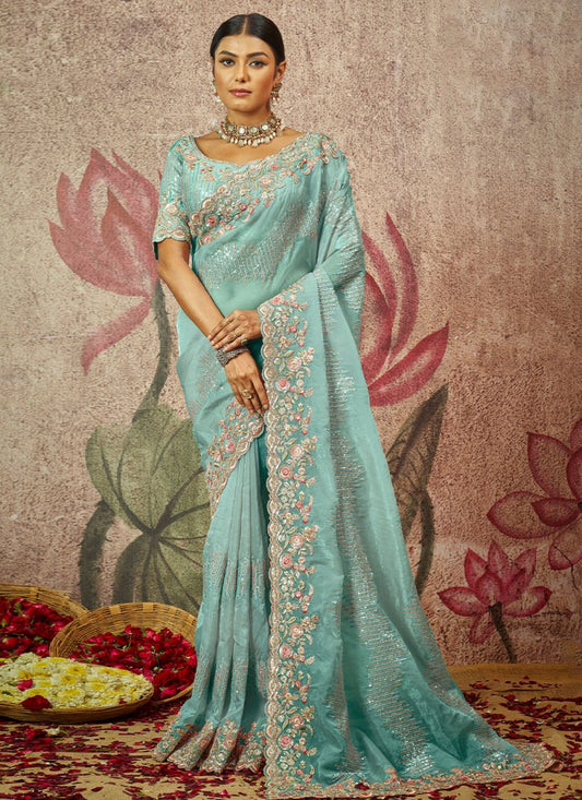 Light Blue pure silk saree with heavy aanchal golden border and printed blouse (Unstitched)