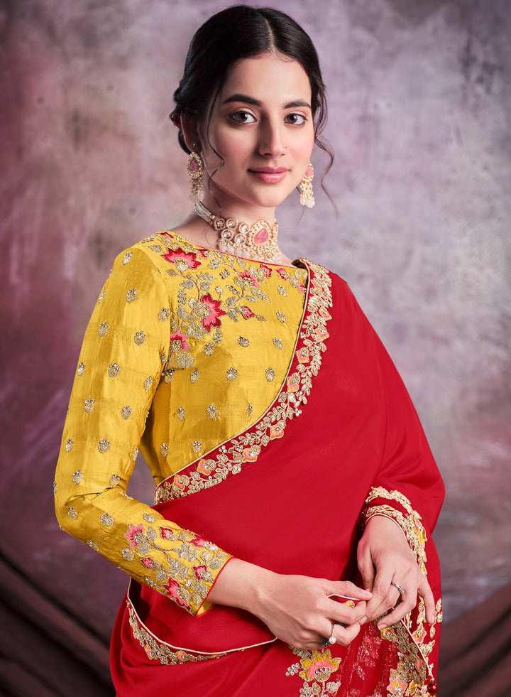 Red pure silk saree with heavy aanchal golden border and yellow printed blouse (Unstitched)