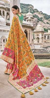 Yellow Patola pure silk saree with heavy aanchal Pink border and printed blouse (Unstitched)