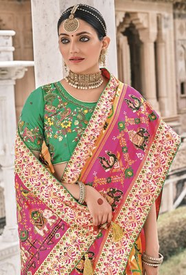 Yellow Patola pure silk saree with heavy aanchal Pink border and printed blouse (Unstitched)