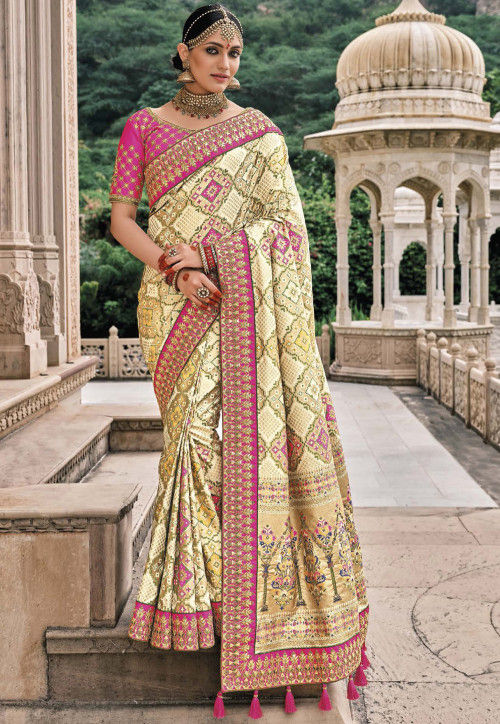 Flax Yellow Patola pure silk saree with heavy aanchal Pink border and printed blouse (Unstitched)