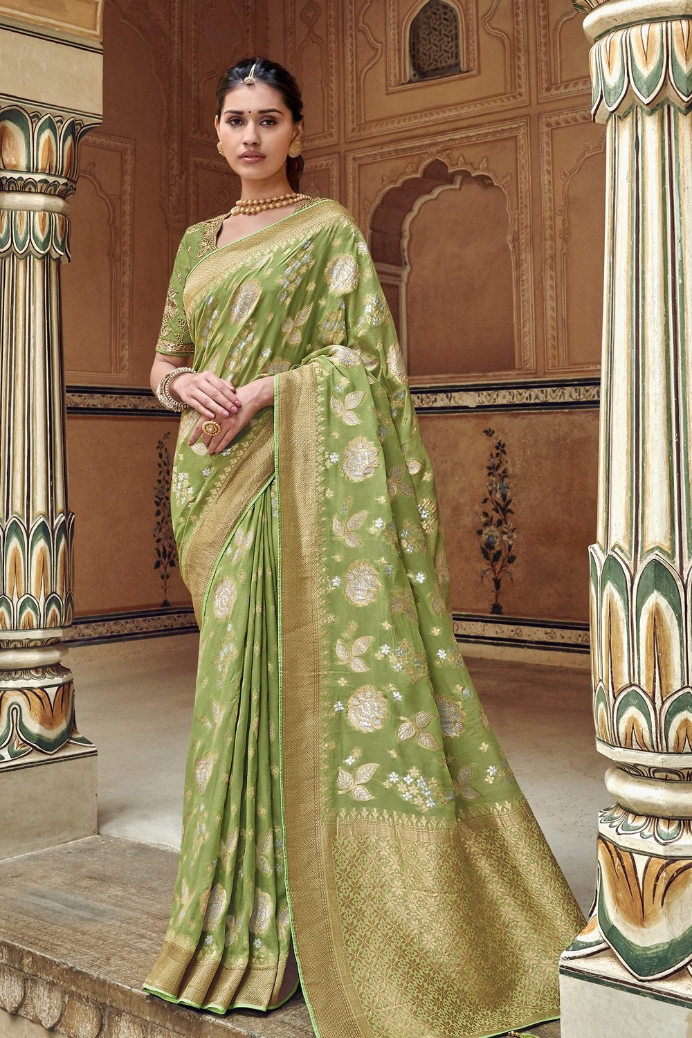 Green pure silk saree with heavy aanchal golden border and printed blouse (Unstitched)