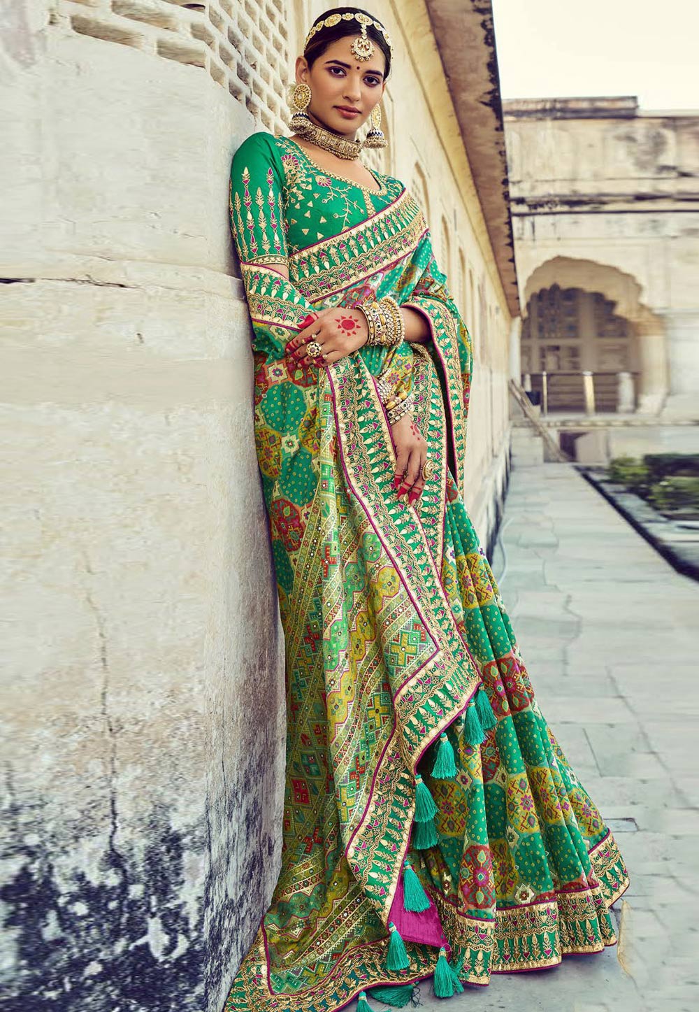 Green pure silk saree with heavy aanchal golden border and printed blouse (Unstitched)