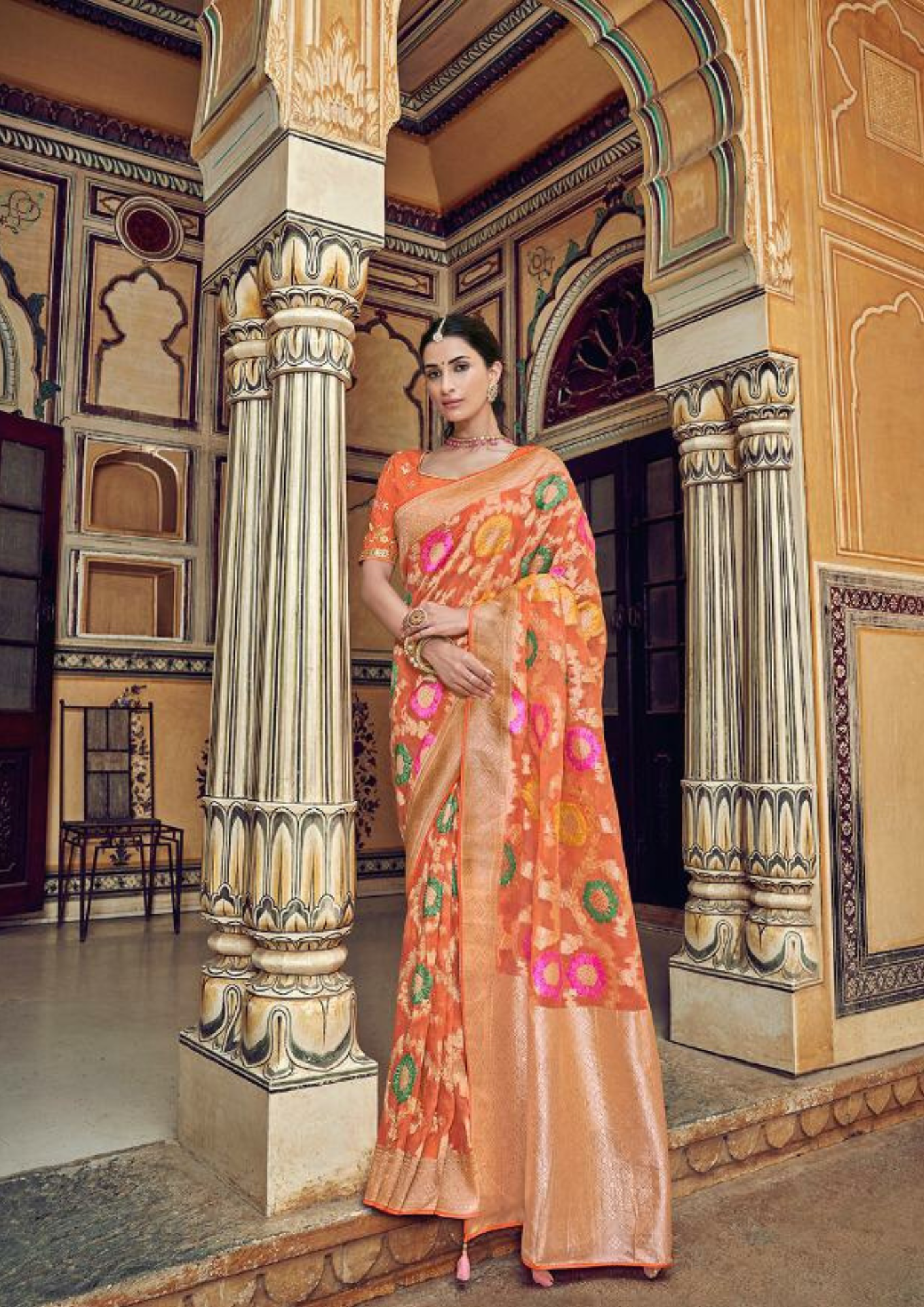 Orange pure silk saree with heavy aanchal golden border and printed blouse (Unstitched)