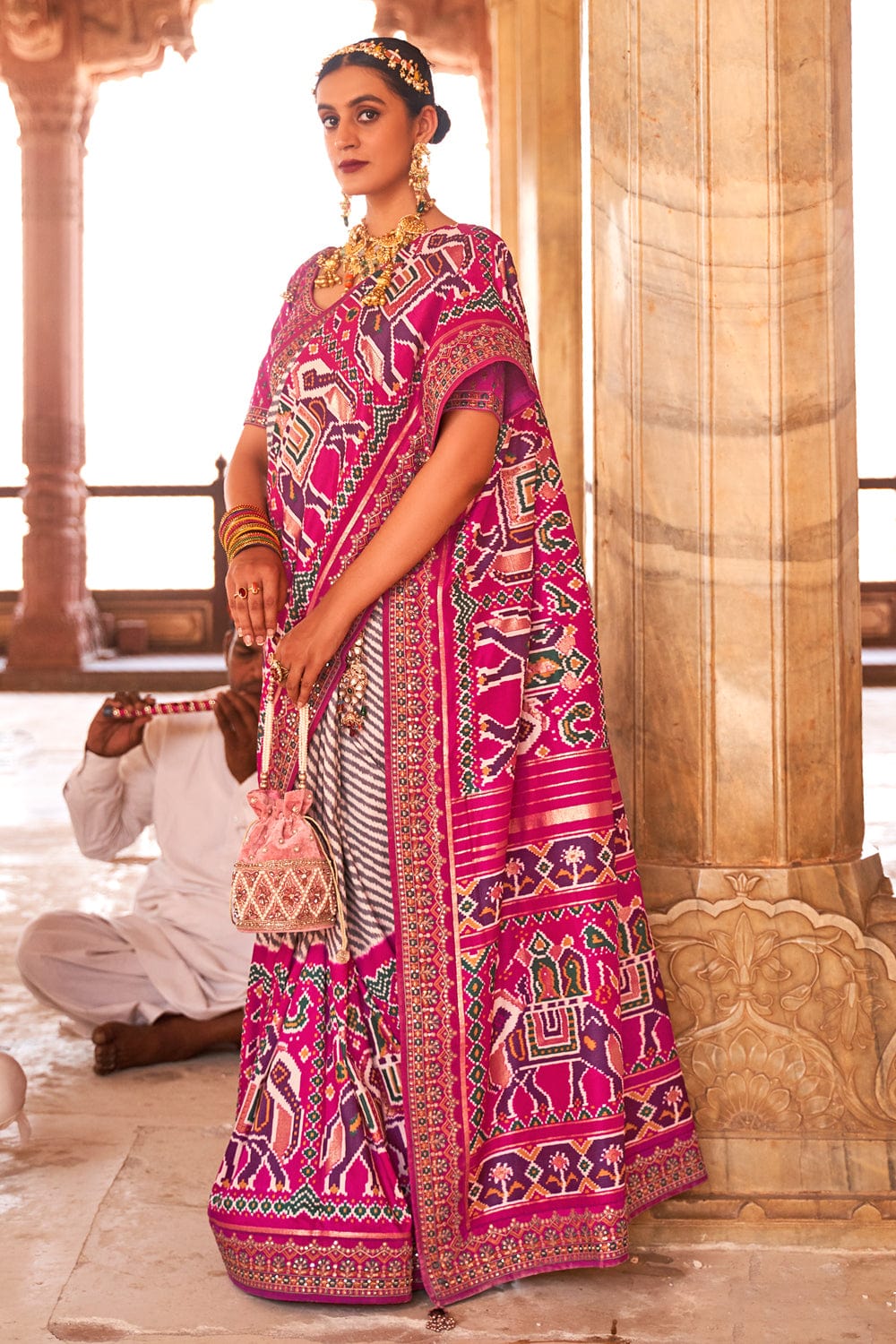 Pink Patola pure silk saree with heavy aanchal golden border and printed blouse (Unstitched)