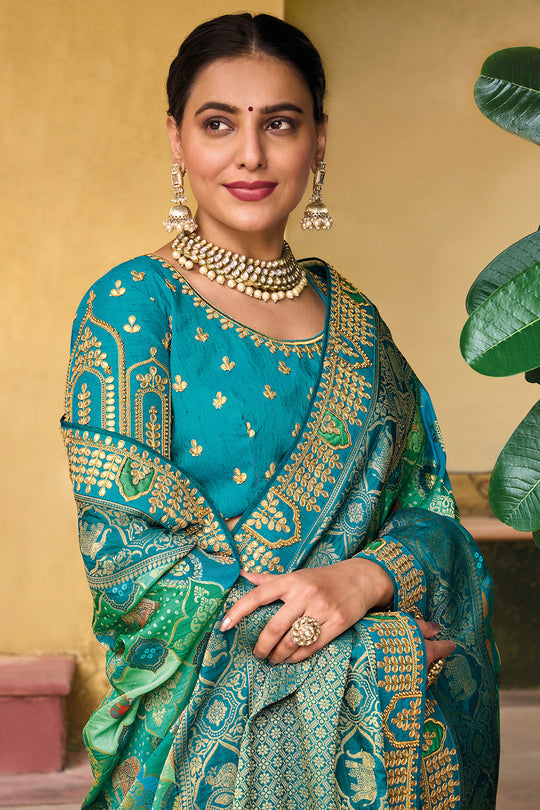 Teal Green pure silk saree with heavy aanchal golden border and printed blouse (Unstitched)