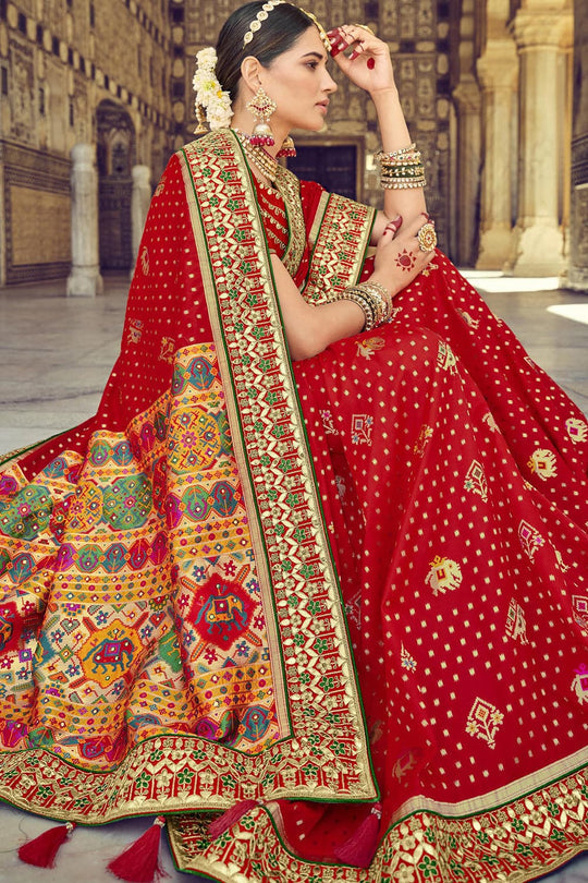 Red pure silk saree with heavy aanchal golden border and printed blouse (Unstitched)