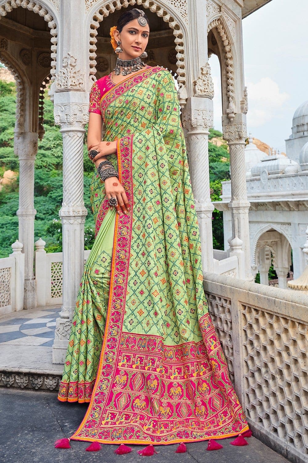 Light Green Banarasi pure silk saree with heavy aanchal pink border and printed blouse (Unstitched)