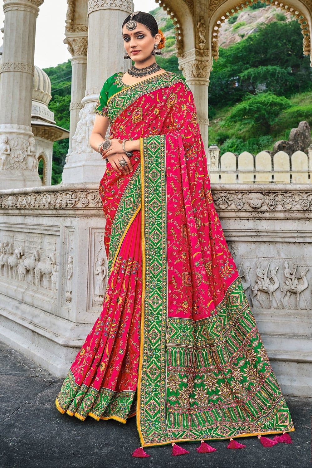 Red pure silk saree with heavy aanchal green golden border and green printed blouse (Unstitched)