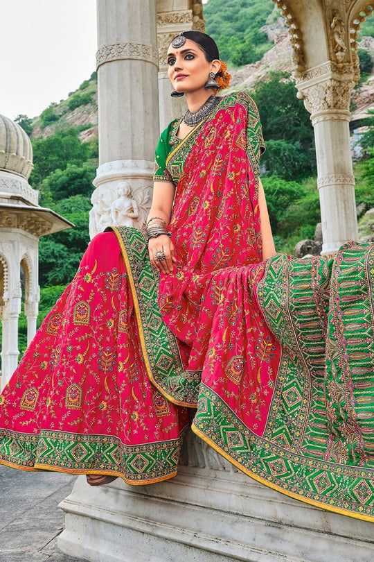 Red pure silk saree with heavy aanchal green golden border and green printed blouse (Unstitched)