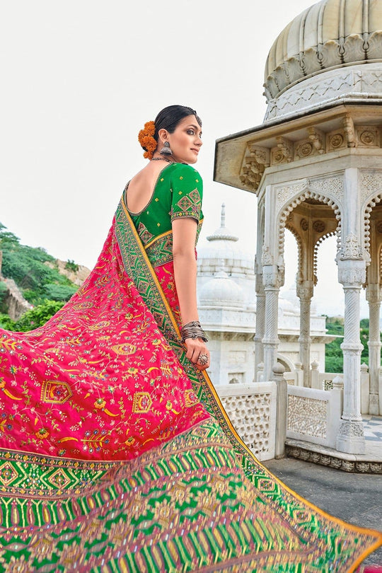 Red pure silk saree with heavy aanchal green golden border and green printed blouse (Unstitched)