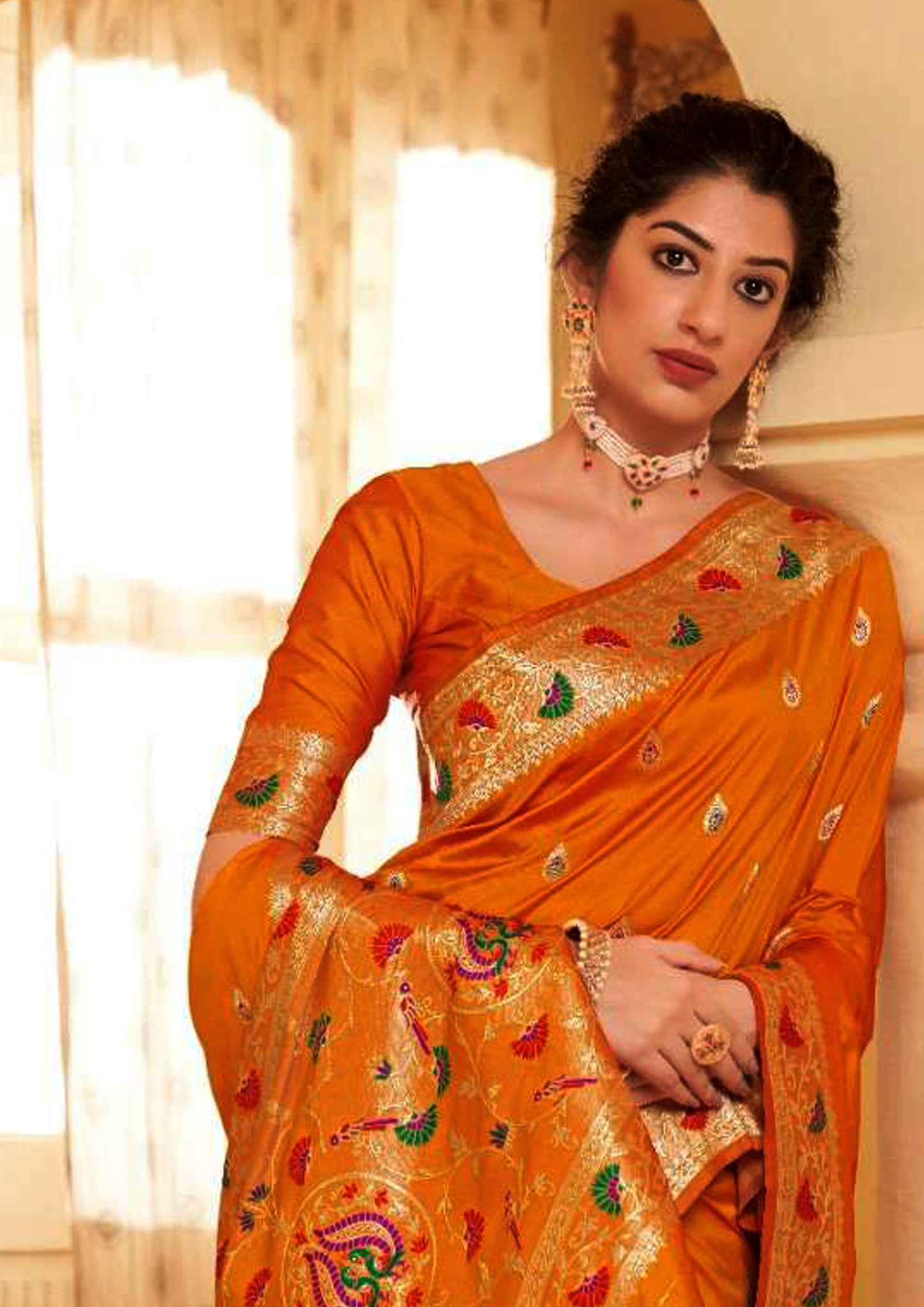 Orange pure silk saree with golden border and matching blouse (unstitched)