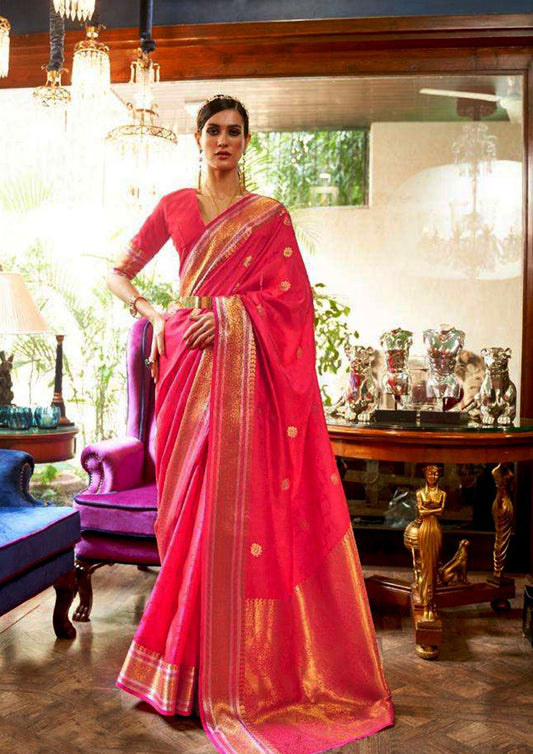 Pink pure silk saree with golden border and pink colored blouse (unstitched)