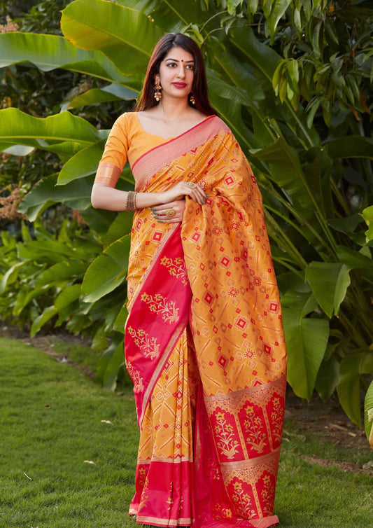 Yellow pure silk saree with red designer border and contrasting blouse (unstitched)